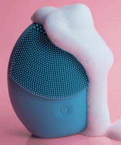 Silicone body scrubber used for gentle exfoliation and deep cleansing during a relaxing shower or bath.
