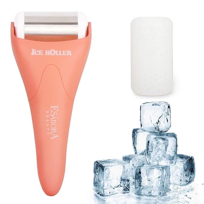 Hand holding a pastel blue ice roller on clear skin – daily self-care tool for skincare, de-puffing, and glow-up routines.
