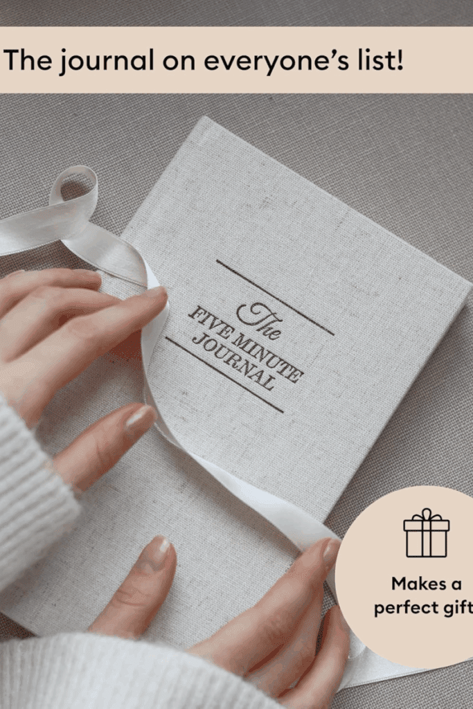 Open daily gratitude journal with gold pen and coffee cup – aesthetic wellness tool for mindfulness and reflection.